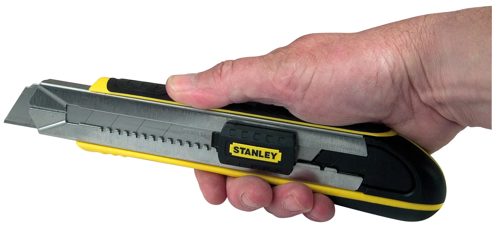 Foto del cuchillo utilitario STANLEY 10-486 sostenido en mano, cuerpo amarillo y negro, vista lateral, herramienta de corte.
