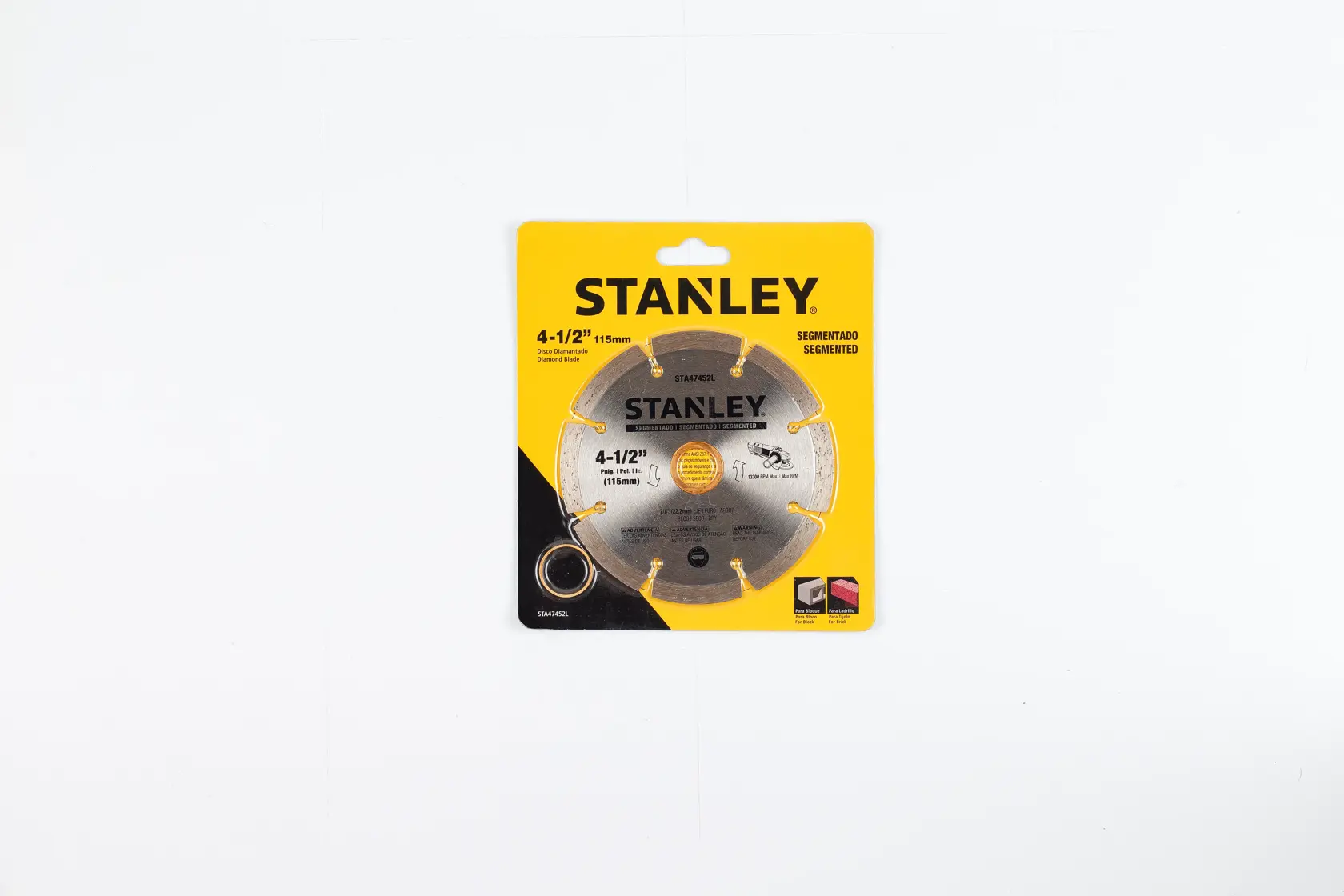STANLEY STA47452L disco de sierra segmentado en empaque amarillo, foto desde arriba sobre fondo blanco.